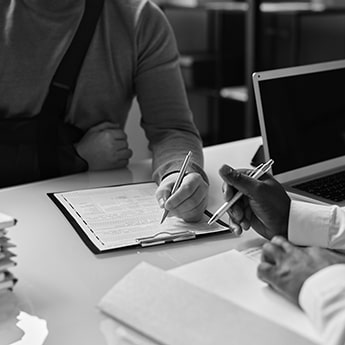 signing insurance papers